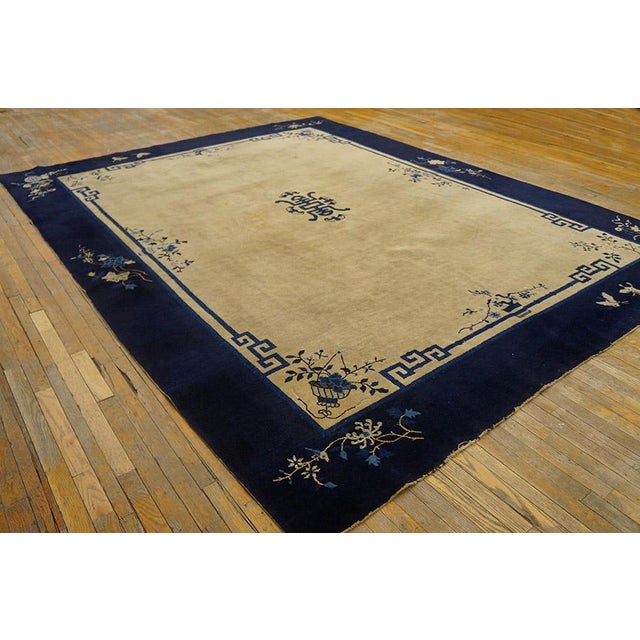 Antique Peking Chinese Floral, Medallion Beige, Blue 1920s Rug, Circa Date: 1920s. This exceptional example of early 20th-...