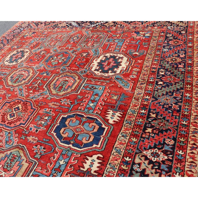 Early 20th Century Antique Heriz Rug With Red Field, Geometric Tribal Motifs and Navy Blue Border 9'2 X 11'10 For Sale - Image 5 of 17