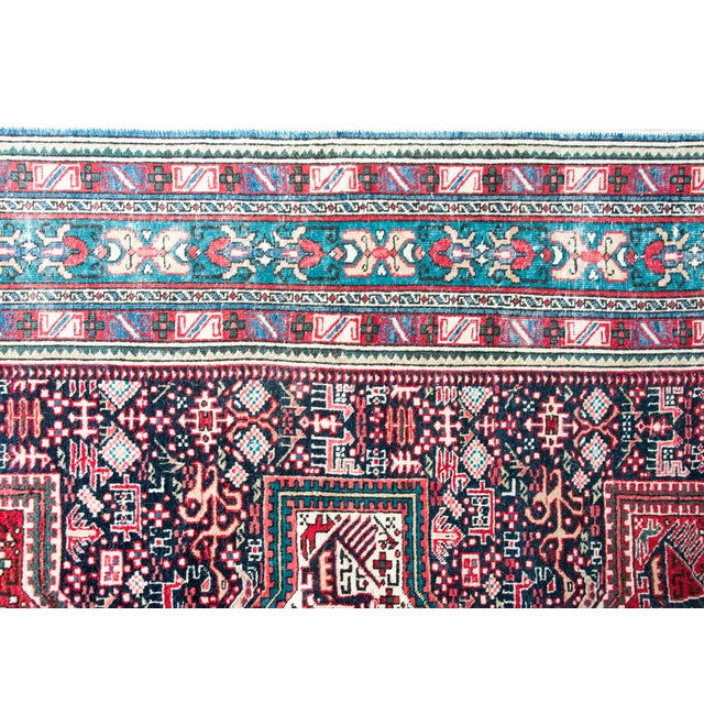 This antique Shirvan rug from Azerbaijan dates to the 1920s and features a striking series of five geometric medallions...