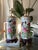 Charming pair of vintage Chinese porcelain table lamps featuring colorful hand-painted birds, peonies, chrysanthemums,...