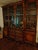 This is a Georgian Style Walnut Four Door Breakfront Bookcase/China Cabinet dating from the last half of the 19th century....