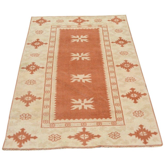 Hand-knotted with care using traditional rug-making techniques, this wool rug blends timeless craftsmanship with a modern...