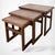Mid century teak tables designed with ceramic inset tops bring timeless elegance and practical function to your living...