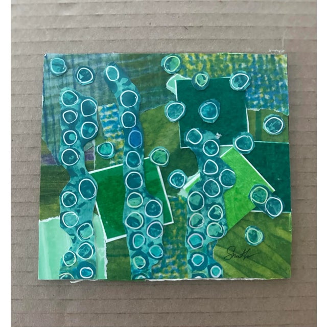 A modern and vibrant abstract inspired by underwater flora. Cool greens and blues are layered with circular motifs,...