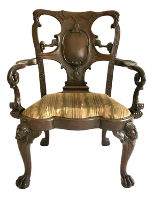 An Early Schmieg & Kotzian Exuberantly Carved Chippendale Mahogany Arm Chair