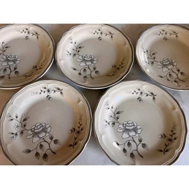 Set of five 6 3/4" dessert plates from the Southampton Stoneware Collection. Plates have a country floral pattern in a...
