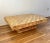 This gorgeous vintage cork coffee table captures attention through the compelling contrast between the natural, earthy...