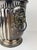 Antique silver-plated champagne bucket featuring beautifully detailed lion head ring handles, fluted sides, and embossed...