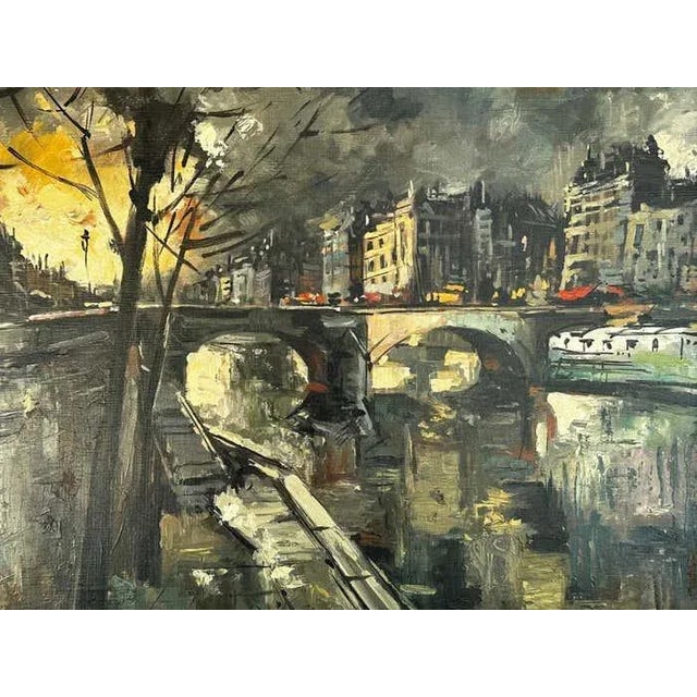 Pierre Giraud's "Embankment of the Seine River" Parisian cityscape, portraying the iconic Pont au Change bridge, offers a...