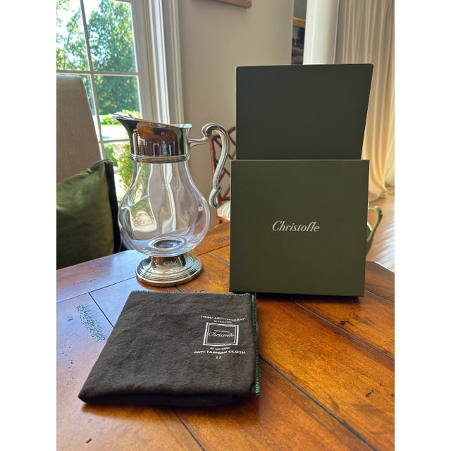 This elegant vintage Christofle crystal and silver plate pitcher is 2 of 2 in our Chairish store. A rare find, this piece...