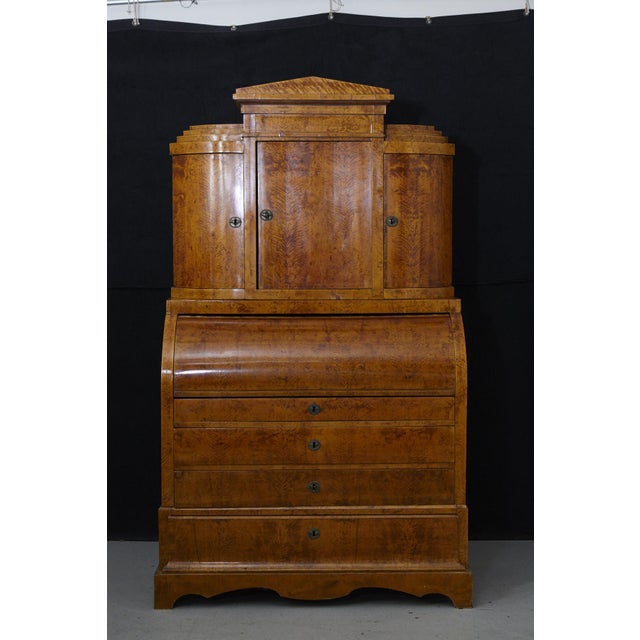 Stunning example of a Biedermeier Secretary. There is some missing veneer on the front and both sides, part of the upper...
