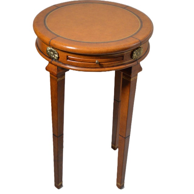 Maitland Smith Style Round Leather Clad Wrapped Brass Gueridon Side Drink Table. The table is mirrored image on all sides,...