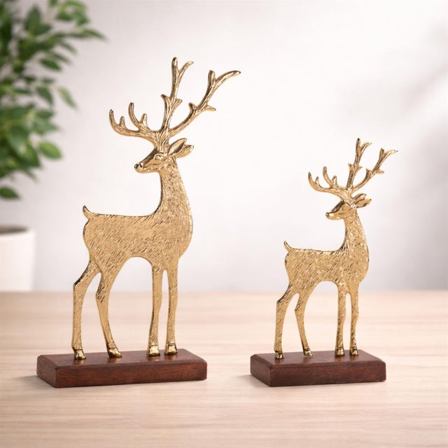 Elevate your seasonal décor with this stunning Gold Metal Deer Figurine Set. Featuring two graceful stag silhouettes...