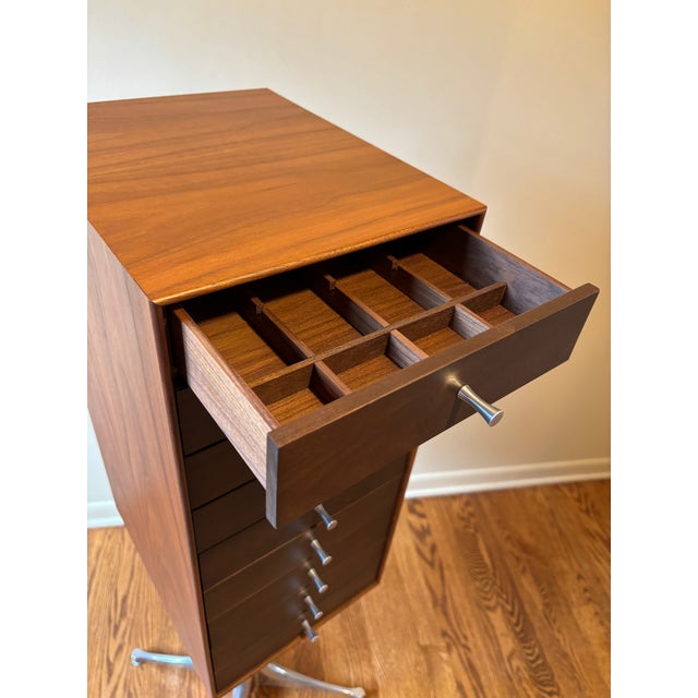Light Walnut Case, Dark Walnut Drawer Fronts on polished cast aluminum base and with polished aluminum drawer pulls.