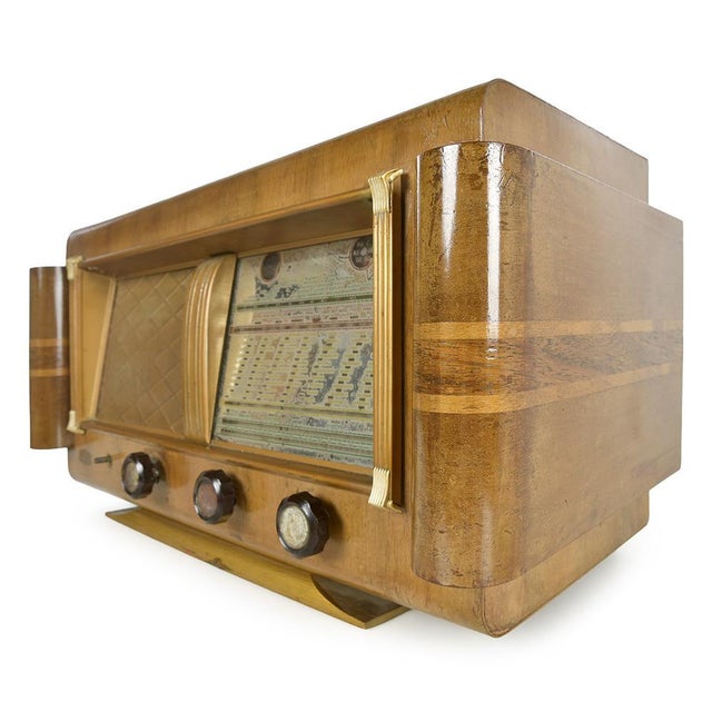 A sonic testament to a bygone era, this vintage radio by arson captivates with its art deco aesthetic and its graphic and...