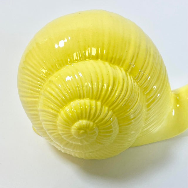 Whimsical, regal and a sheer delight. This Mid-Century Folk Art Ceramic Snail will delight your guests and make you smile....