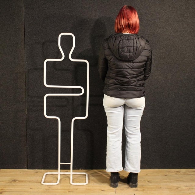 Valet stand, Italy, 1970s. Postmodern piece of furniture composed of white tubular metal elements, with beautiful lines,...