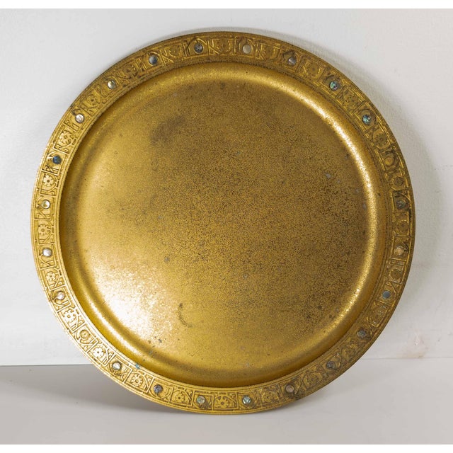 We are selling this gorgeous large Tiffany Studios Dore bronze charger. This charger could be displayed on a wall, or used...