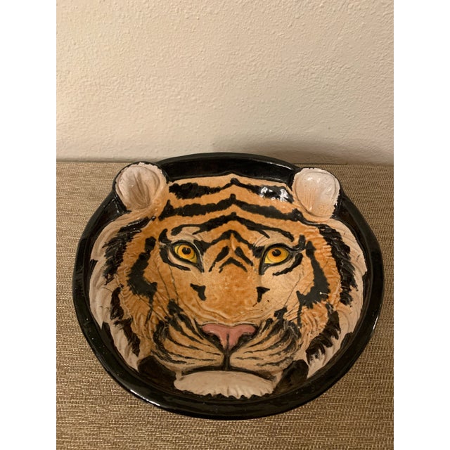 Gorgeously painted Majolica pottery lions head bowl. This piece is a solid heavy piece and hand painted with remarkably...