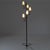 Iconic Italian floor lamp from the 1950s, with five light points arranged on “X” shaped metal arms, in black painted metal...