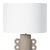 The primitive, vase-like, cast metal base of the Chandra Table Lamp is dappled with a natural, paper mache finish. A...