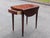 This exceptional Federal-style mahogany Pembroke drop-leaf table perfectly embodies early American sophistication,...