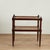 Handsome antique British colonial stand crafted in rosewood with two hand caned tiers on classic turned faux bamboo...