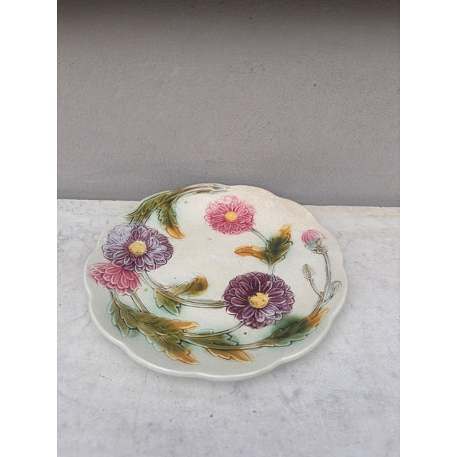 Lovely French Majolica plate with purple and pink dahlias Orchies, circa 1900.