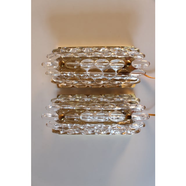 Pair of expresive wall sconces by the Swedish designer Carl Fagerlund. They are manufactured for the Danish Lamp Company...