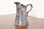 A gorgeous antique Victorian silver soldered repoussé pitcher By Tiffany & Co. USA, Late 19th Century Measures: 8"W x...