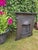 A handsome antique cast iron combination fireplace dating to circa 1915, displaying the substantial construction and crisp...