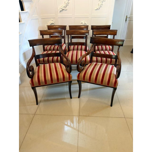 A superb quality set of eight Regency mahogany dining chairs comprising six side chairs and two elegant carvers. The...
