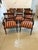 A superb quality set of eight Regency mahogany dining chairs comprising six side chairs and two elegant carvers. The...