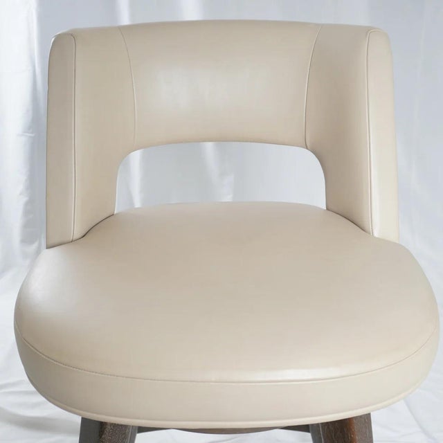 Elegant and expertly crafted, this pair of Minerva Counter Stools from HOLLY HUNT Studio showcases the brand's signature...