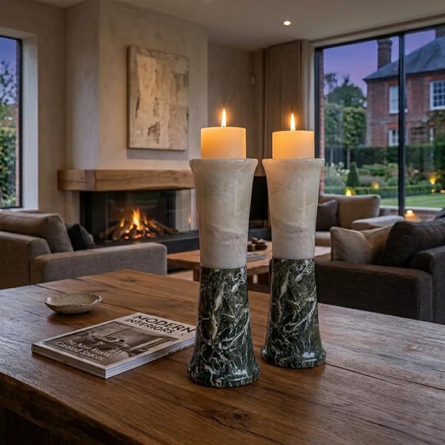 A quiet study in contrast, this tealight holder combines black and white marble in a compact, sculptural form. The...
