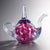 A rare, high-contrast St. Clair art glass teapot with vivid magenta florals suspended in crystal clarity. An exceptional...