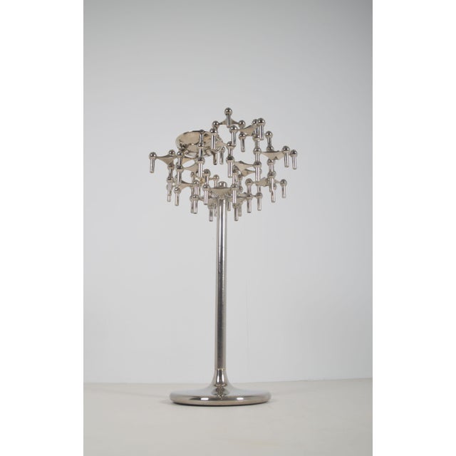 A pair of tall-footed candlesticks designed in the 1960s by Fritz Nagel in collaboration with the architect/artist Werner...