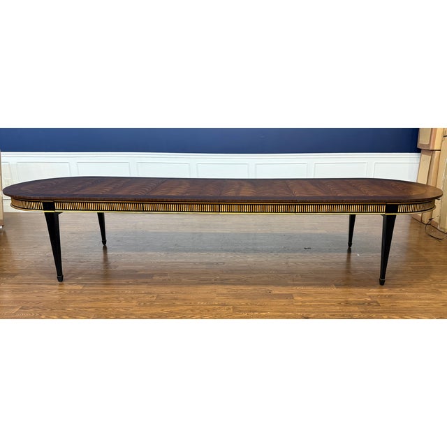 This is the Barrington Dining Table from the Monarch Collection of Century Furniture. Its classic Regency styling features...