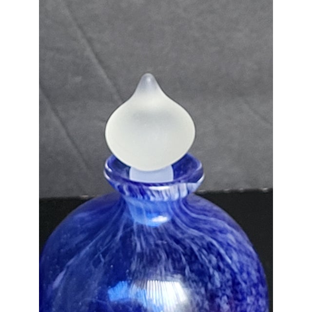 A timeless statement piece that will brighten any room in the space. Blue glass is a perfect accent piece in any setting....