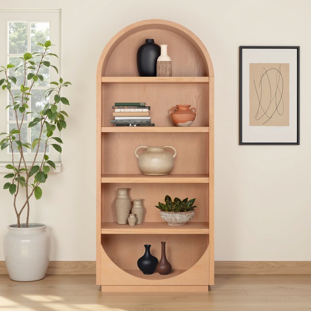 With its graceful curves and warm wood tones, the Marlow Bookcase offers timeless style with a modern edge. The arched...