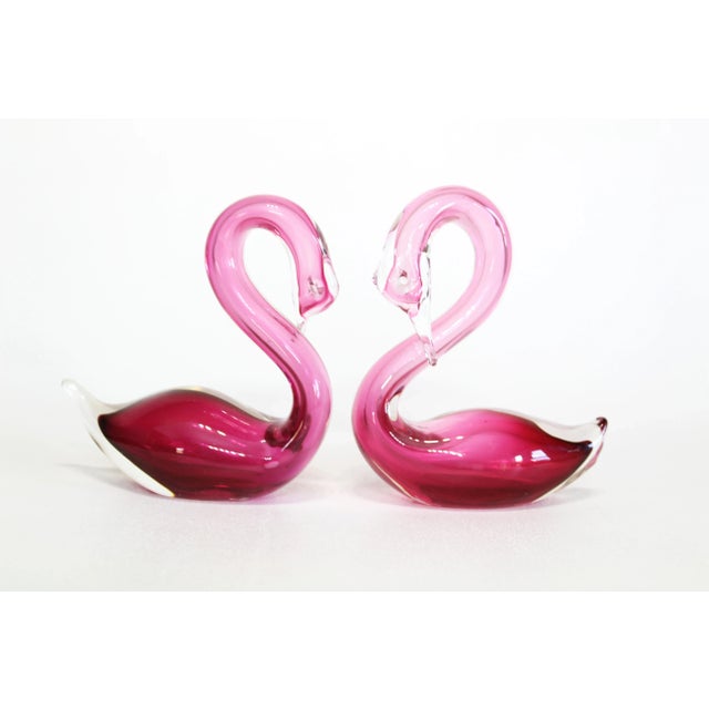 Vintage pair of hand thrown pink glass swans Mark " R " Dimensions; 5" Width x 2" Depth x 6" Height See pictures and...