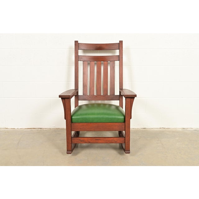 A gorgeous antique Mission or Arts & Crafts period rocking chair In the manner of Stickley Brothers USA, Early 20th...