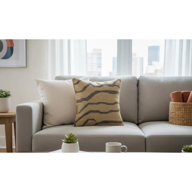 This 16x16 pillow cover is crafted from an authentic vintage handwoven kilim featuring bold earthy tones of mustard brown...