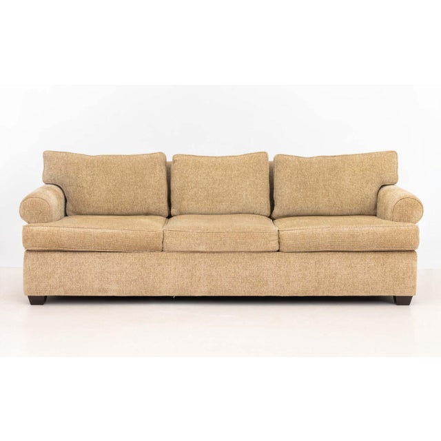 Modern Beige Chenille Upholstered Three-Seat Sofa. 29.5" H x 87" W x 37" D; seat: 18" H. Provenance: From an East 86th...