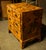 Petite burl olive campaign style chest. Chest has 4 drawers, 2 small drawers at the top and 2 larger drawers below. It has...