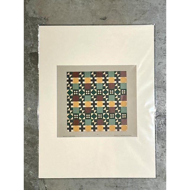 This vintage mid-century modern serigraph on paper features a vibrant interplay of color and form, showcasing a rhythmic...