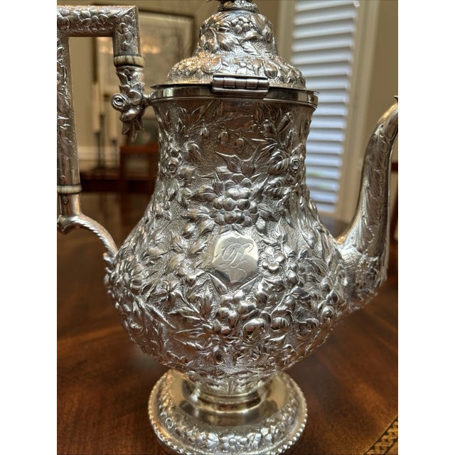 An extraordinary 19th-century American coin silver tea/coffee pot by master silversmith Andrew Ellicott Warner (A.E....