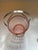 Elevate your barware collection with this charming Depression glass ice bucket, crafted in a soft rose-pink hue and...