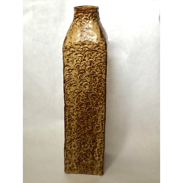 A striking vintage studio pottery bottle vase by Ruth Batkin, signed “RLB” on the underside. The tall, architectural form...