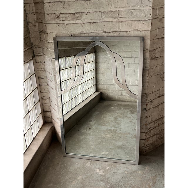 Inspired by 1970s French design, this large rectangular mirror draws on the minimalist, sculptural forms seen in the work...